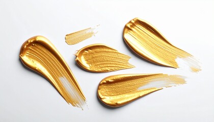 Metallic Gold Brushstrokes &ndash; Glossy Textured Paint Streaks on White Surface