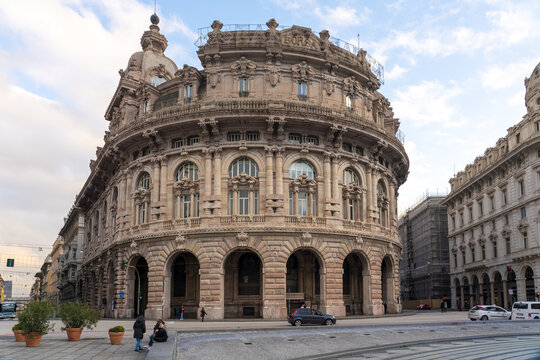 Genoa, Italy - 25 December 2022: View of the Palazzo della Borsa, its ornate facade glowing softly under the diffused daylight, a symphony of stone and shadow.