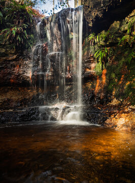 The periodic mungoes waterfall flowing after heaving rain hidden in Ashdown Forest on the high weald east Sussex south east England UK