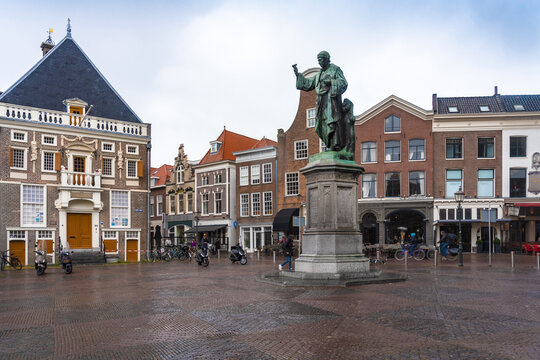 Haarlem, Netherlands - 06 May 2019: View of the Grote Markt square where the statue of Laurens Janszoon Coster stands tall amidst the historic buildings.
