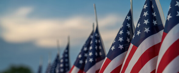 American Flag Waving Against Sky Symbol of Freedom and Patriotism