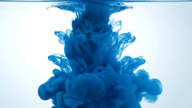 Blue ink dispersing in water