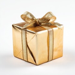 Elegant gold gift box with ribbon on white background