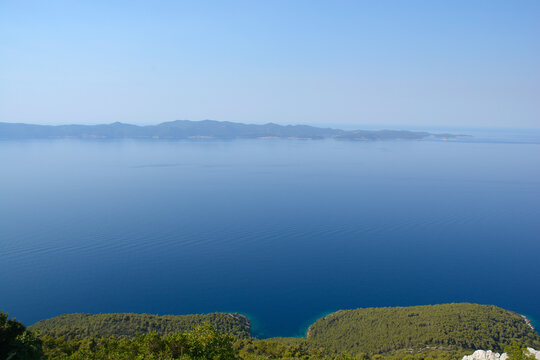 A high angle panoramic view from Sveti Ivan on Peljesac peninsula overlooking the calm blue sea toward Mljet island