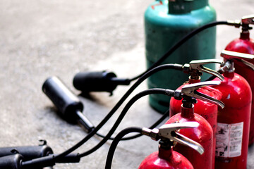 Fire extinguishing equipment and gas tanks.