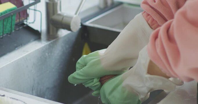 Clean your range hood, wipe the stove, and wash the dishcloth.