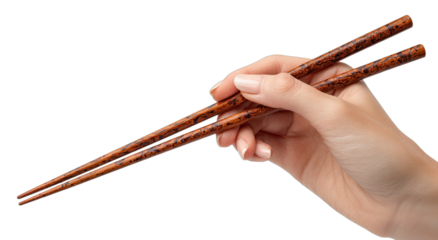 Elegant hand holding dark wood chopsticks, poised for dining