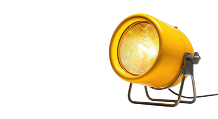 Bright yellow industrial spotlight illuminates with a strong glow on a black background