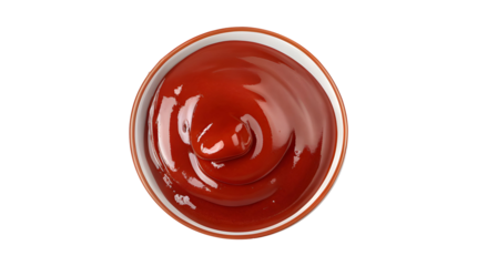 Upside down view of ketchup bowl showcasing glossy sauce texture.
