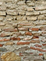 old brick wall, red and white colour, broken bricks, peeling plaster, vintage texture, copy space