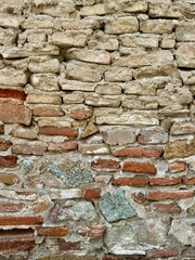 Obraz premium old brick wall, red and white colour, broken bricks, peeling plaster, vintage texture, copy space