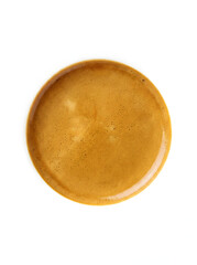 Espresso crema viewed from above. Rich brown coffee foam texture. crema on white background