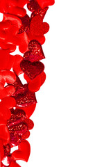 Red hearts border on white background with copy space. Love and romance concept for Valentines Day greeting card, wedding invitation, anniversary design.
