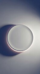 Subtle Radiance: Minimalist White Circle with Shadow and Ethereal Light