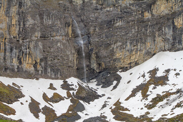 High mountain waterfall in Klausen Pass, Switzerland