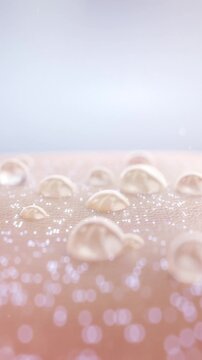 Essence drops absorbed on skin, deep cell melanin disappears, cells rejuvenate, facial spots and wrinkles disappear, anti-aging, laser beauty, concept skin care beauty. Cosmetic ads, 3D rendering.