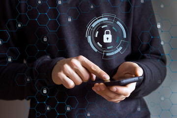 Man with phone, a concept of digital security with a lock icon.