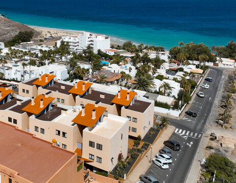 A town with white houses, hotels alond the coast of Atlantic ocean.