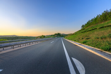 Long, empty highway with a white line down the middle
