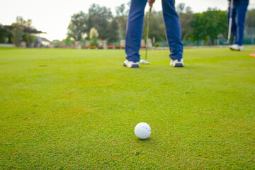 People, golfers enjoying on the golf course