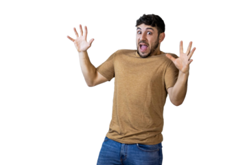 Young man showing fear and surprise with open mouth and raised hands. PNG