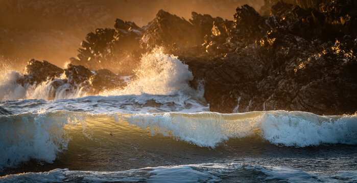 Rough seas at sunset at Port Dafarch Beach Anglesey Wales