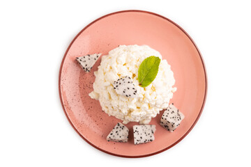 White Сottage cheese, Curd, with Pithaya isolated on white, top view, flat lay, close up.