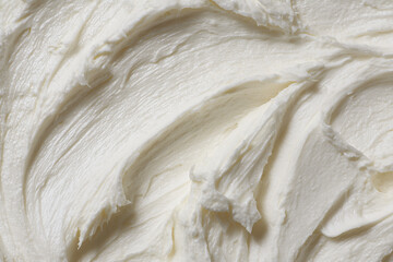 Soft white face cream texture with gentle abstract strokes, close up skincare background highlighting natural hydration purity and premium cosmetic smoothness