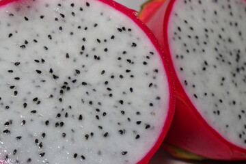 Fresh Dragon Fruit (Pitaya) on White Background, Exotic Tropical Fruit with Vibrant Pink Skin and Juicy Pulp, Healthy Food Concept