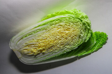 Fresh Chinese Cabbage (Napa Cabbage) on White Background, Organic Leafy Vegetable, Healthy Eating and Asian Cuisine Concept