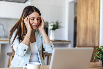 Headache, laptop and remote work with woman in living room of home for small business burnout. Computer, migraine and stress with freelance employee in apartment for startup error, fail or mistake.