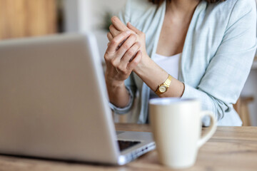 Business woman, hands and wrist pain with injury for carpal tunnel syndrome or strain in home. Female person, freelancer or remote work with sore joint, inflammation or sprain for overworked muscle.