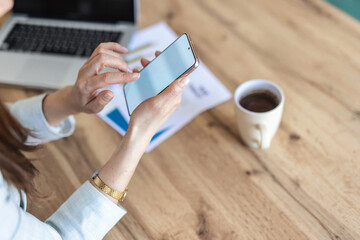 Phone, hands and scroll with woman in home office for account manager, financial advisor or communication. Virtual consultant, client portfolio and update with closeup of person for contact and email.