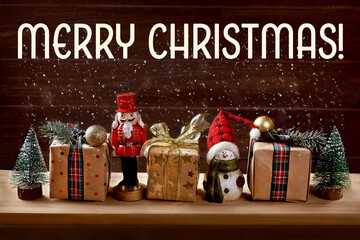 Christmas presents and decors on a wooden shelf with wishes