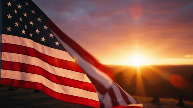American flag waving at sunset with remember and honor