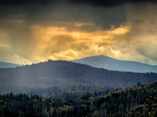 Sunny Autumn Carpathians with Puffy White During The Sunset