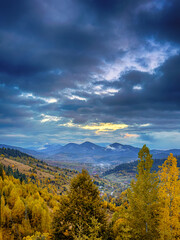 Sunny Autumn Carpathians with Puffy White During The Sunset