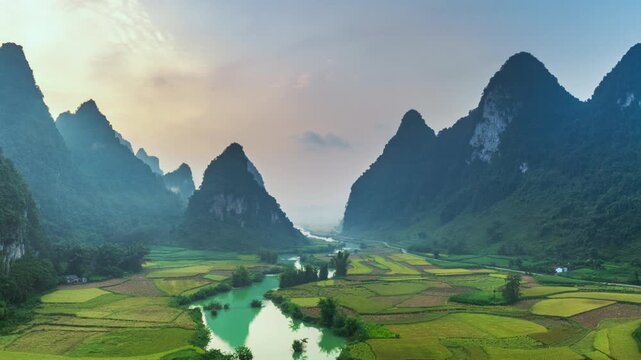 Hyperlapse aerial drone view of rice terrace paddle field around the river at Phong Nam, Trung Khanh, Cao Bang, Vietnam
