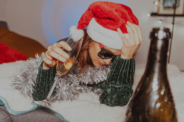 Drunk woman on new year's eve. The problem of alcoholism and loneliness during the Christmas and New Year holidays