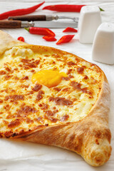Adjarian Khachapuri with egg yolk and cheese