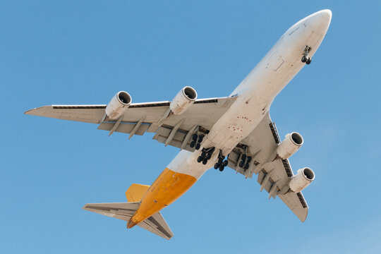 S&atilde;o Paulo, Brazil &ndash; August 23, 2025: Boeing 747-8 aircraft painted in white and yellow colors at S&atilde;o Paulo Guarulhos International Airport.