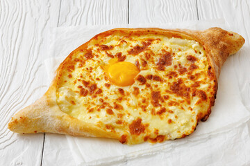 Adjarian Khachapuri with egg yolk and cheese