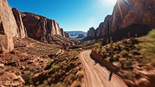 Thrilling drive through majestic desert canyons under a bright sunny sky