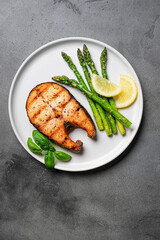Grilled salmon steak with asparagus