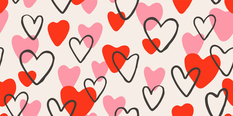 Abstract seamless pattern in artistic doodle style with overlapping colorful hand drawn hearts, for modern holiday background or wrapping paper, vector illustration