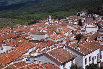 Terra cotta roof tops of the historical town of Grazalema, Cadiz, Andalusia, Spain. The town is nestled in the Sierra de Cadiz on Andalusia's white village route - 'Ruta de los Pueblos Blancos. © john copland