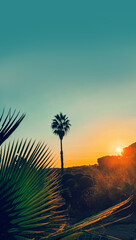 Exotic landscape background. Silhouette of a palm tree against a vibrant tropical sunset with foregrounds and gradient sky from turquoise to orange color, beautiful landscape, vacations concept