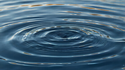 The serene dance of concentric ripples expanding across a calm aquatic surface, creating a mesmerizing pattern of fluid motion and gentle reflection under soft light