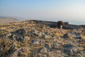 Fortress on a hilltop. Ruined castle. Old architecture.