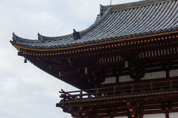 Fototapeta premium Traditional Japanese Temple With Grand Wooden Architecture, Sacred Grounds, And Scenic Courtyard. Nara City, Japan